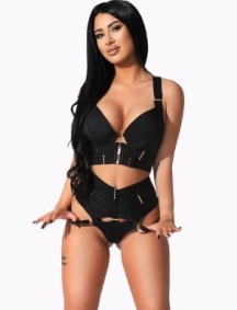Mimi radiates charm with a captivating pose and an intense gaze.