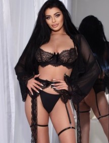 Brazilian escort Porsha showing off her sexy physique from behind