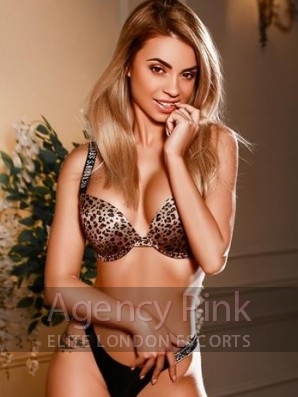 London escort Mandy in her nude colour underwear and heels Picture 3