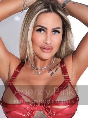 Naughty escort Dione is looking ready to have fun in this image Picture 2