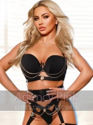 Anita posing in a sparkly chain underwear outfit and knickers Picture 2