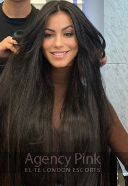 Agency escort Dusty with her long dark hair and beautiful features