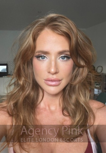 Erin in her escort selfie profile picture for Agency Pink