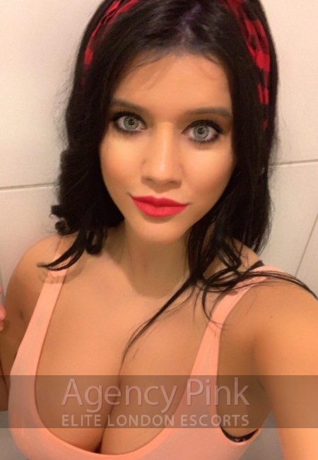 Cali in her selfie picture for the escort agency website